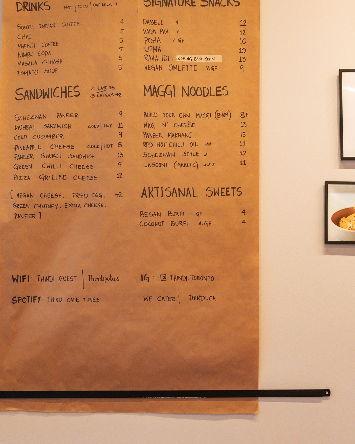 The handwritten kraft-paper menu board at Thindi Cafe, College Street